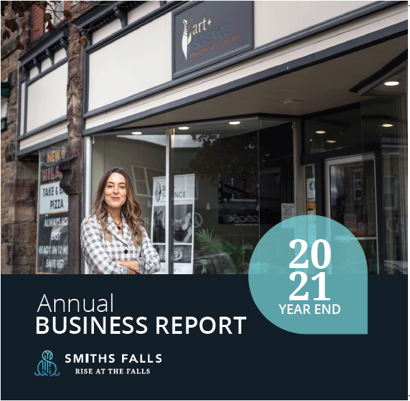 Business owner standing infront of store