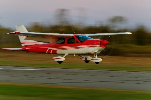 Plane landing on runway