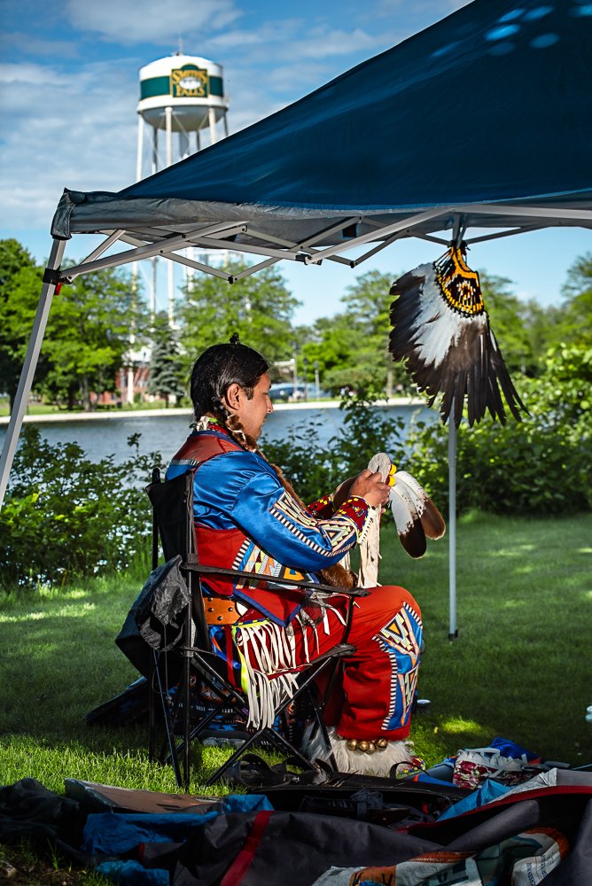 First Nations person dressed in indigenous clothing