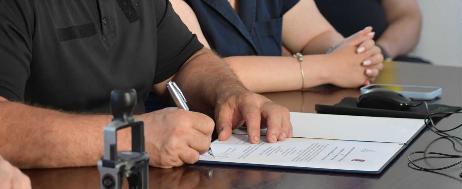 Agreement Signing Banner Image