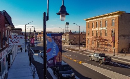 downtown street with vehicles