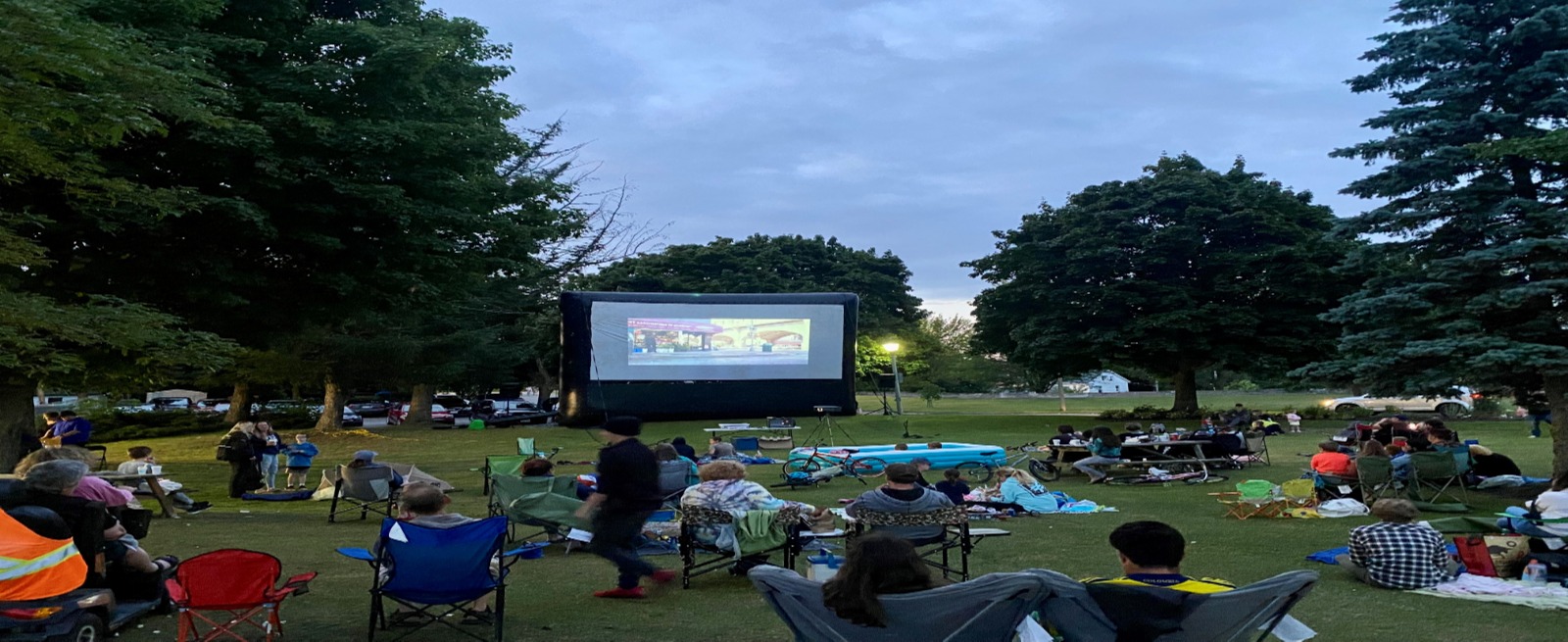 Movies Playing on Big Screen Outside 