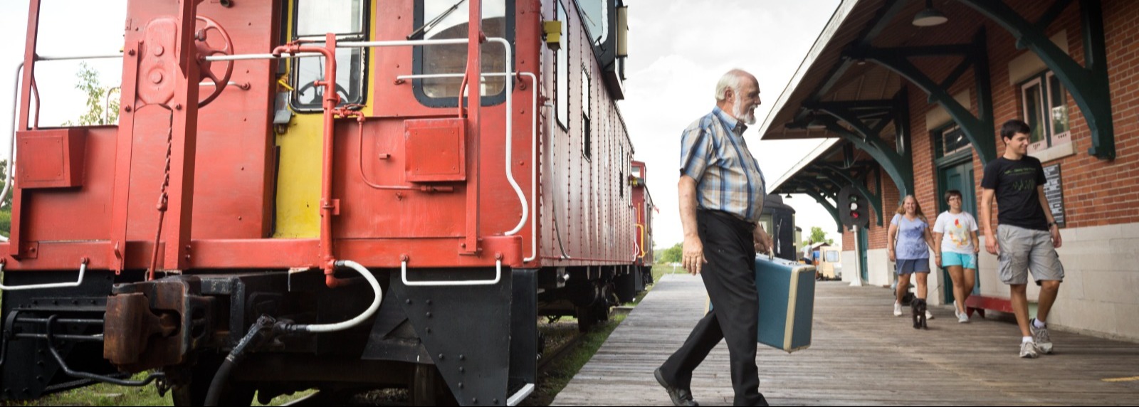 Man getting off train