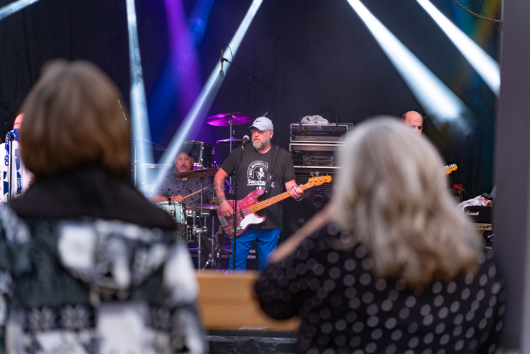 A band performs on the main stage at the Downtown Music Festival.