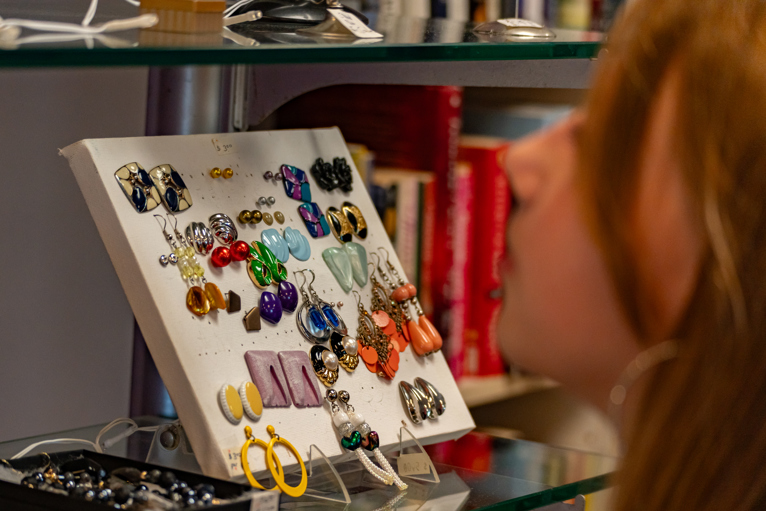 A young girl browses the shelves at The New Old Town.